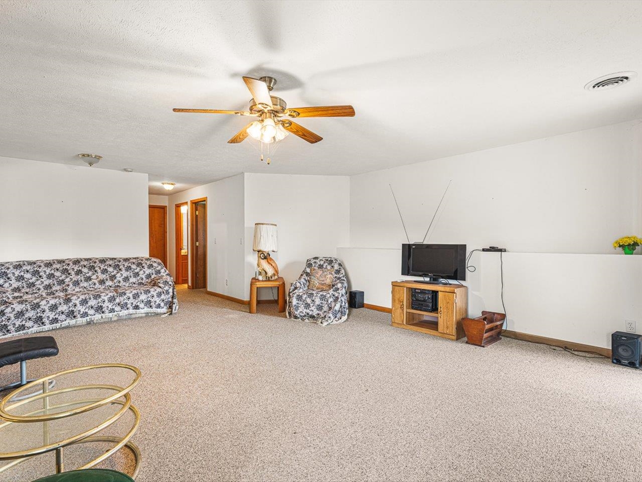 1106 Drexel Road Lake Summerset, IL 61019 - Photo 31 of 43 a bedroom with furniture and a chandelier