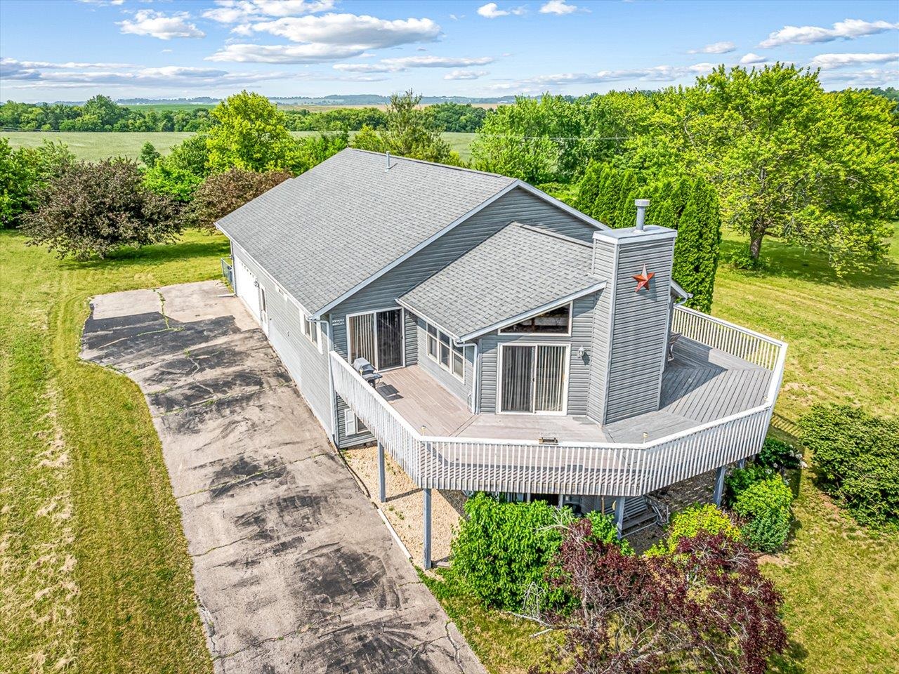 1106 Drexel Road Lake Summerset, IL 61019 - Photo 42 of 43 a aerial view of a house with a yard balcony and outdoor seating