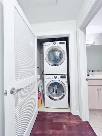 a utility room with dryer and washer