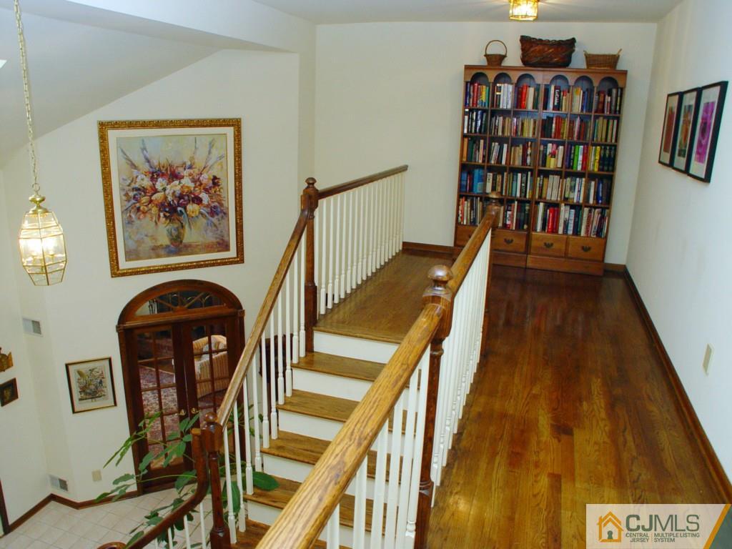 8 Maher Road Somerset, NJ 08873 - Photo 11 of 25 a view of a entryway with furniture and wooden floor