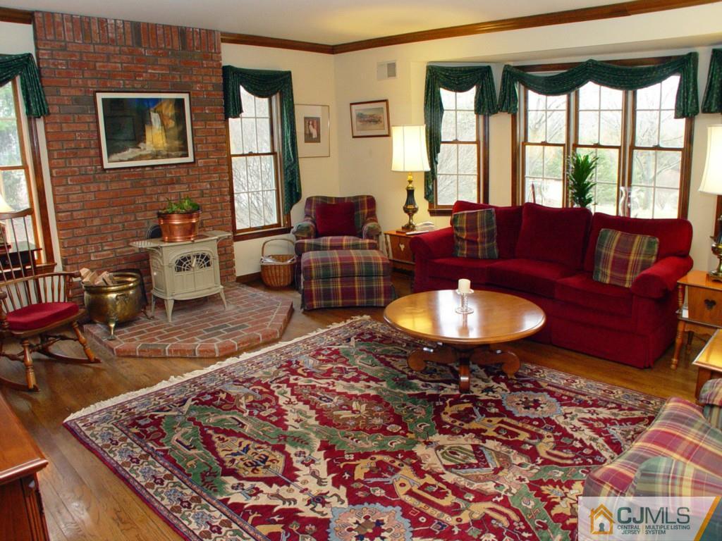 8 Maher Road Somerset, NJ 08873 - Photo 6 of 25 a living room with furniture and a table