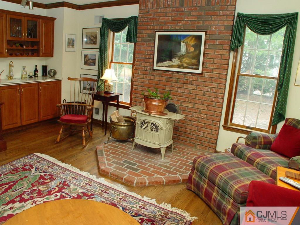8 Maher Road Somerset, NJ 08873 - Photo 7 of 25 a living room with furniture rug and wooden floor