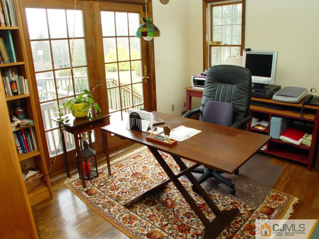 8 Maher Road Somerset, NJ 08873 - Photo 10 of 25 a view of a workspace with furniture and a window