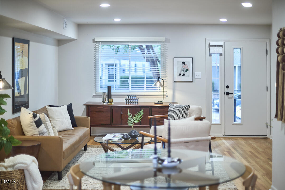 2613 McNeil Street, Unit B Raleigh, NC 27608 - Photo 13 of 31 a living room with furniture and a large window