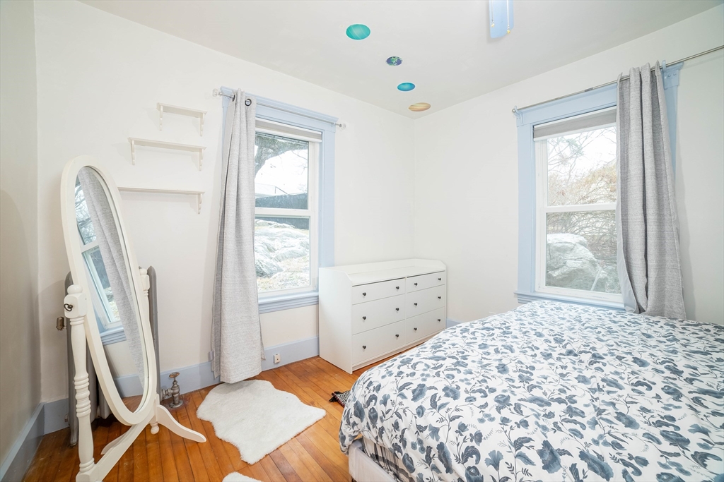 2 Mystic Street Worcester, MA 01607 - Photo 19 of 42 a bedroom with a bed and a window