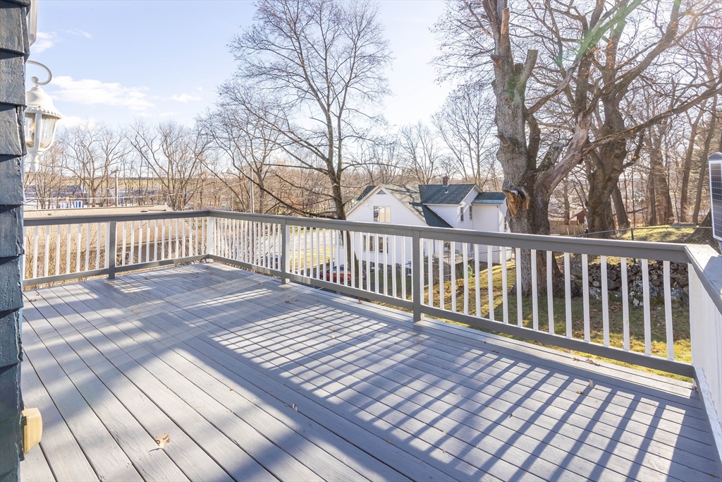 2 Mystic Street Worcester, MA 01607 - Photo 33 of 42 a view of a wooden roof with wooden fence