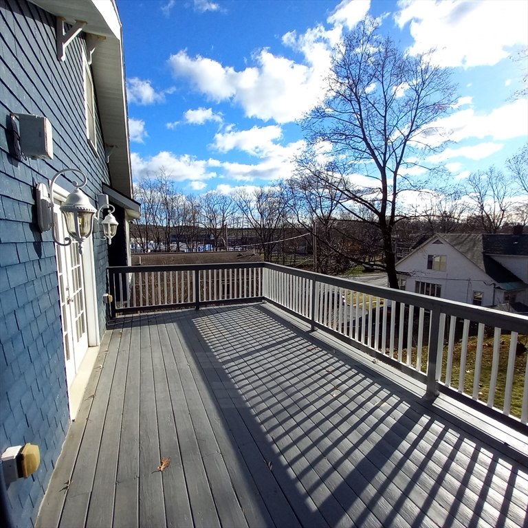 2 Mystic Street Worcester, MA 01607 - Photo 39 of 42 a view of balcony with wooden floor
