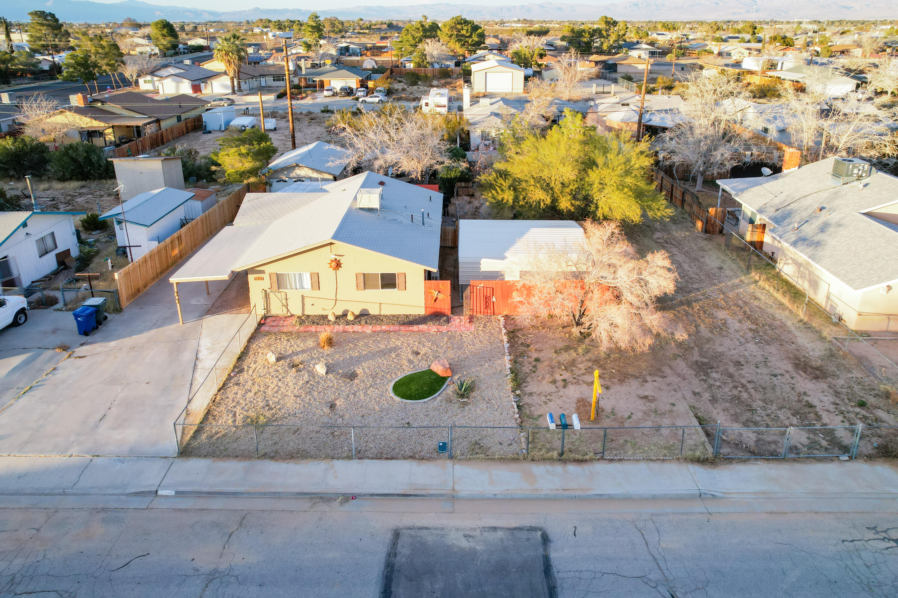 1228 West St George Avenue Ridgecrest, CA 93555 - Photo 1 of 30 an aerial view of residential houses with outdoor space