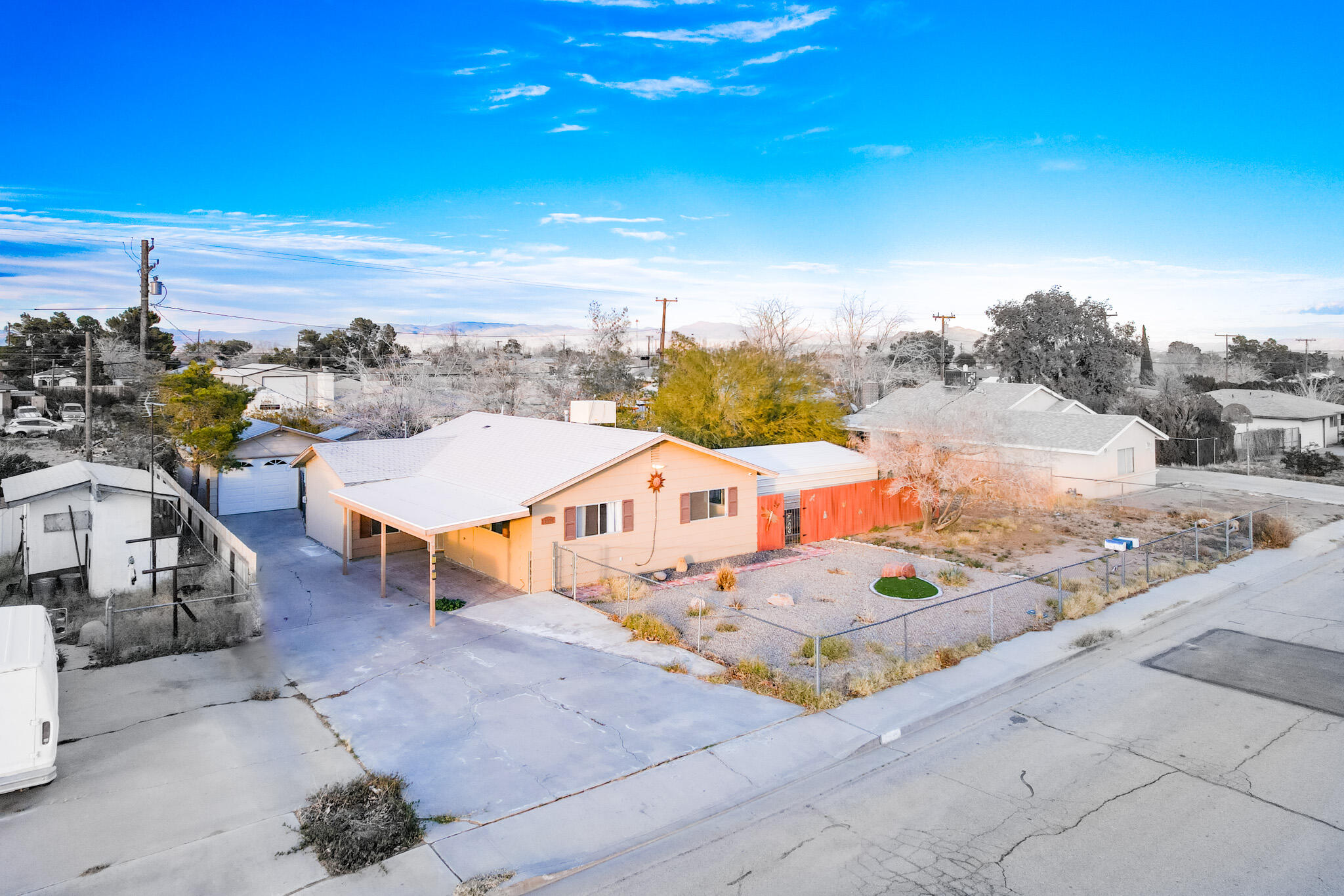 1228 West St George Avenue Ridgecrest, CA 93555 - Photo 6 of 30 a view of a terrace with lawn chairs