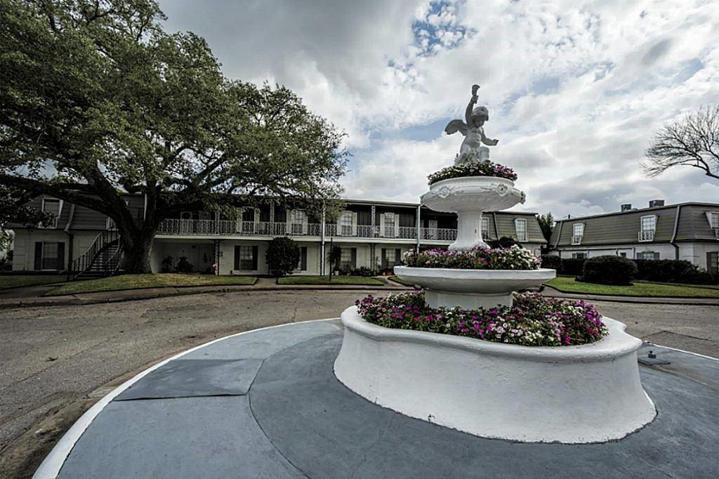 9031 Rue Cambon Street, Unit 69 Houston, TX 77074 - Photo 13 of 13 a view of a house with swimming pool and sitting area