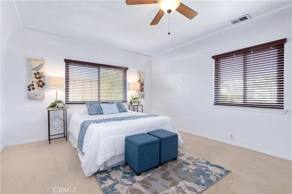 1024 Robin Circle Arroyo Grande, CA 93420 - Photo 17 of 35 a bedroom with a bed and a window