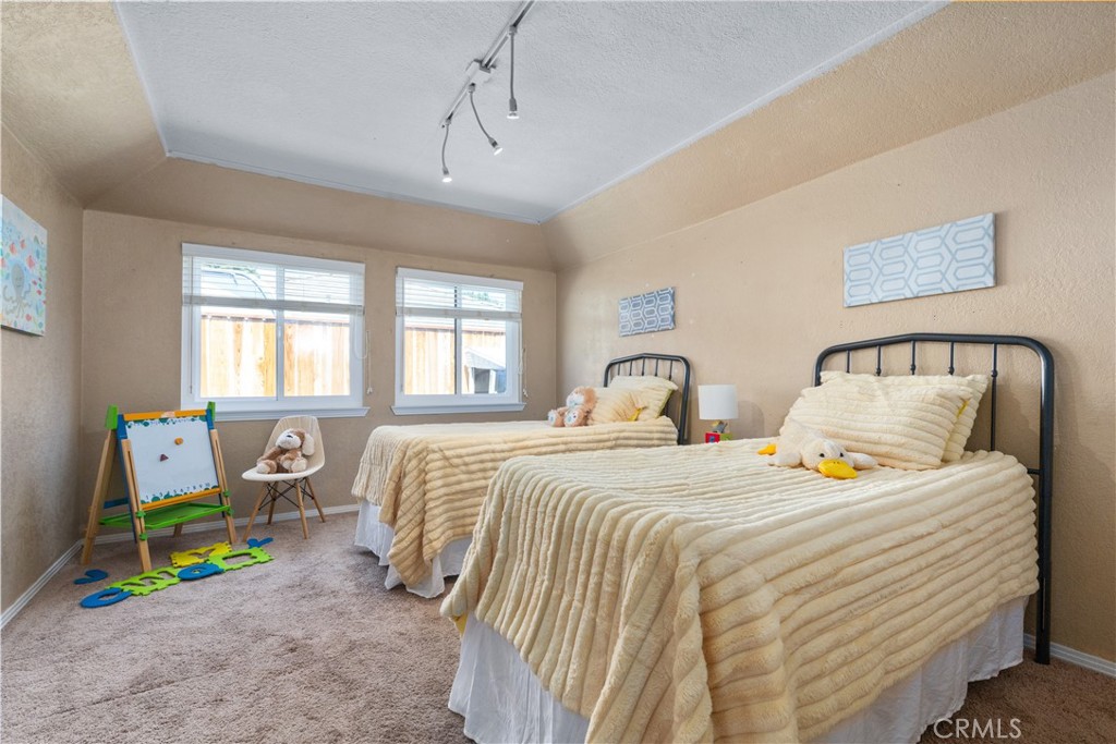 1024 Robin Circle Arroyo Grande, CA 93420 - Photo 20 of 35 a bedroom with bed and window