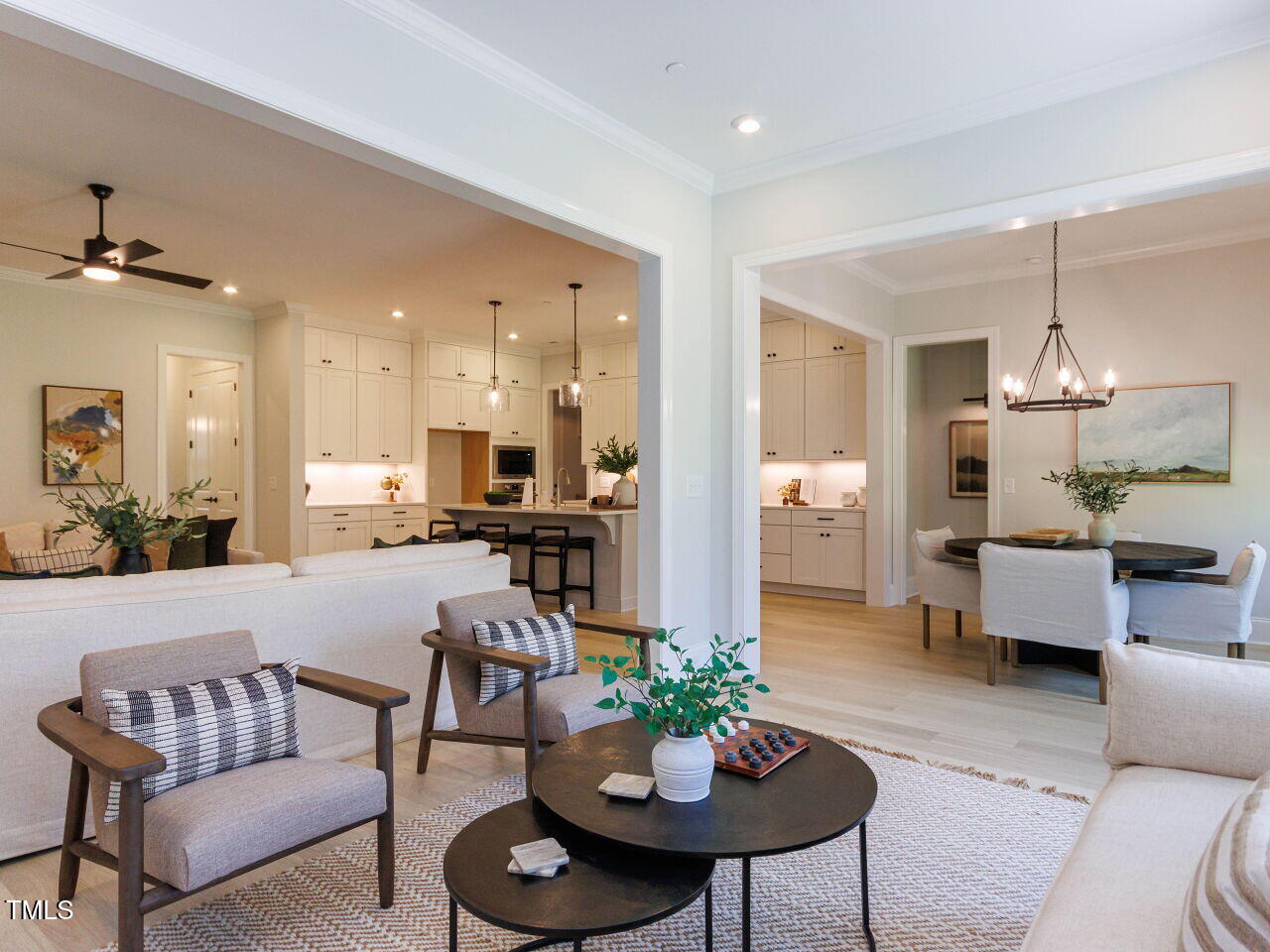 1031 Coldspring Circle Durham, NC 27705 - Photo 14 of 44 a living room with furniture kitchen view and a table