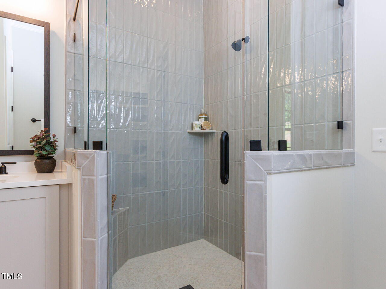 1031 Coldspring Circle Durham, NC 27705 - Photo 20 of 44 a bathroom with a shower