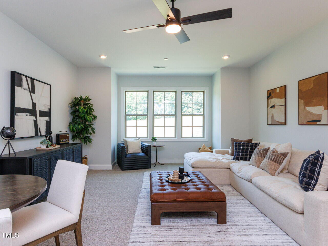 1031 Coldspring Circle Durham, NC 27705 - Photo 25 of 44 a living room with furniture or couch and a window