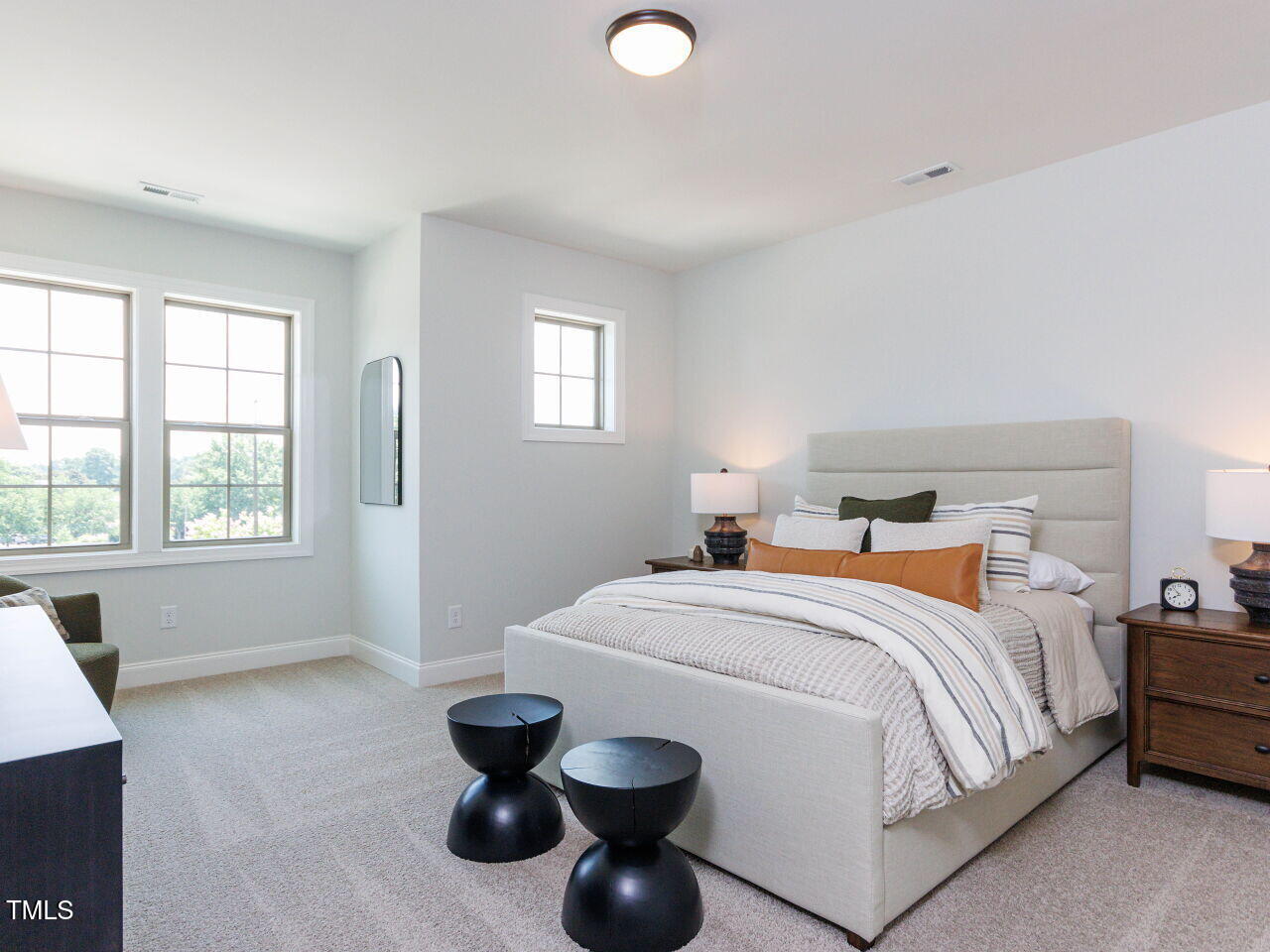 1031 Coldspring Circle Durham, NC 27705 - Photo 33 of 44 a bedroom with a bed and a large window