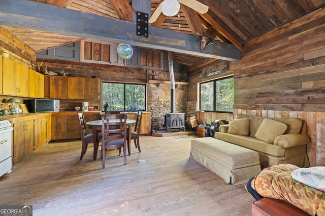 a dinning table and chairs in a room