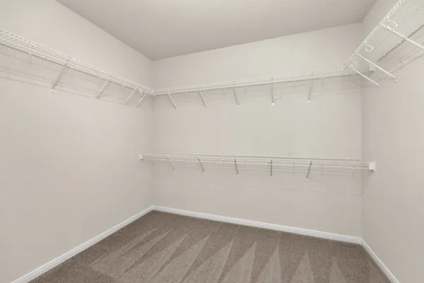 a view of a room with shelf on the wall