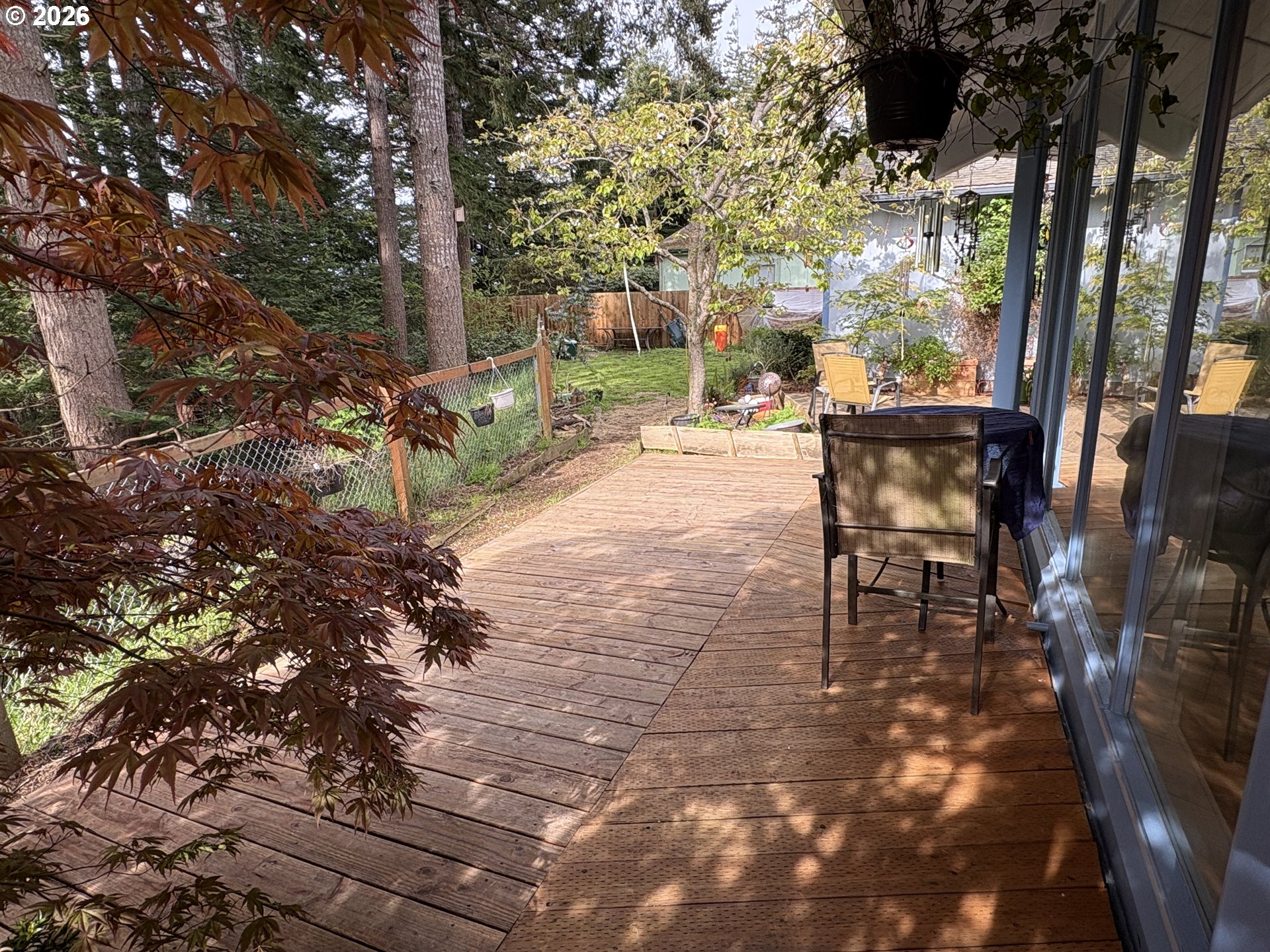 1625 Kristi Loop Lakeside, OR 97449 - Photo 30 of 41 a view of a tables and chairs in a patio