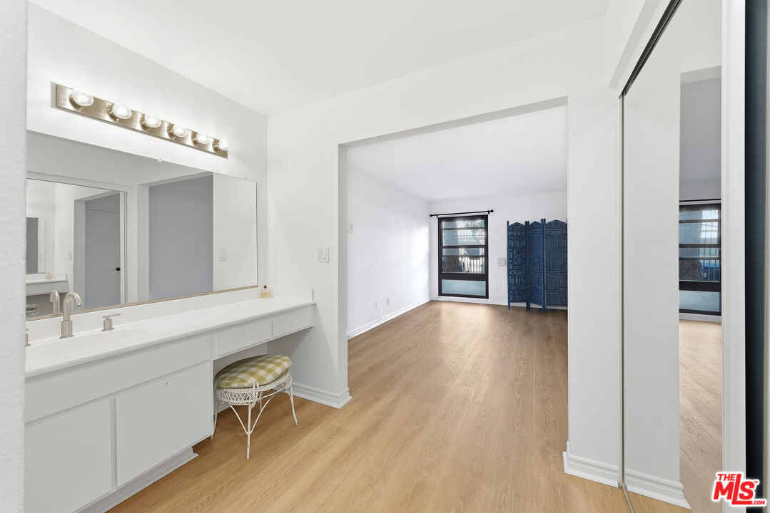 7740 Redlands Street, Unit G1095 Playa del Rey, CA 90293 - Photo 13 of 25 a spacious bathroom with a sink and a mirror