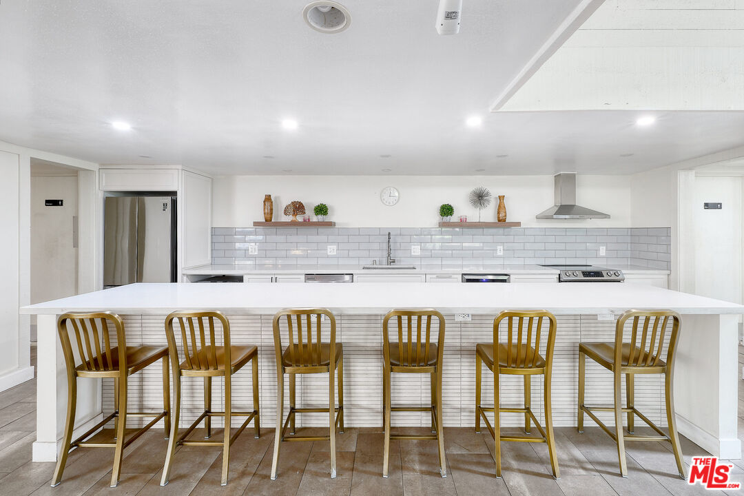 7740 Redlands Street, Unit G1095 Playa del Rey, CA 90293 - Photo 24 of 25 a view of a dining room with furniture