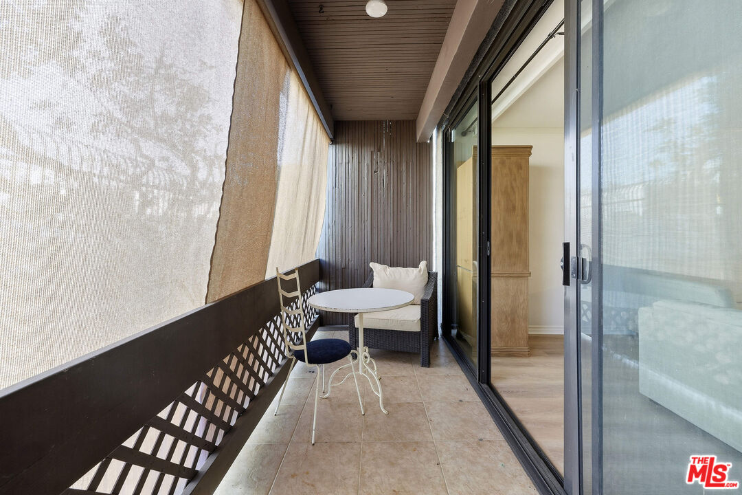 7740 Redlands Street, Unit G1095 Playa del Rey, CA 90293 - Photo 7 of 25 a balcony with view of outdoor space