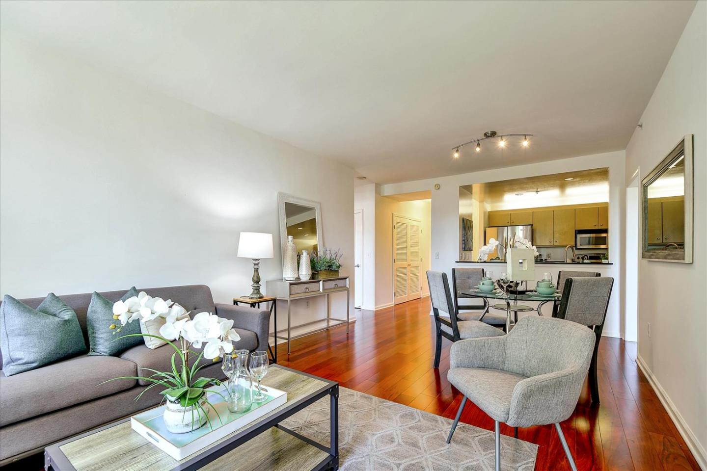 140 South Van Ness Avenue, Unit 422 San Francisco, CA 94103 - Photo 1 of 32 a living room with furniture and a large window