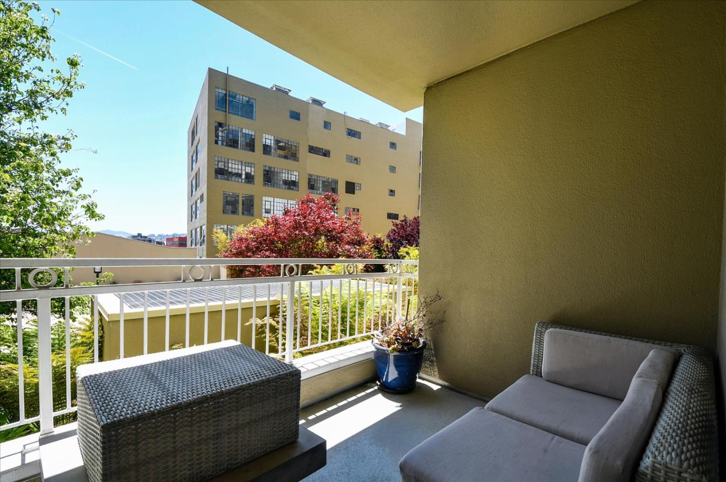 140 South Van Ness Avenue, Unit 422 San Francisco, CA 94103 - Photo 23 of 32 a room with furniture and a table