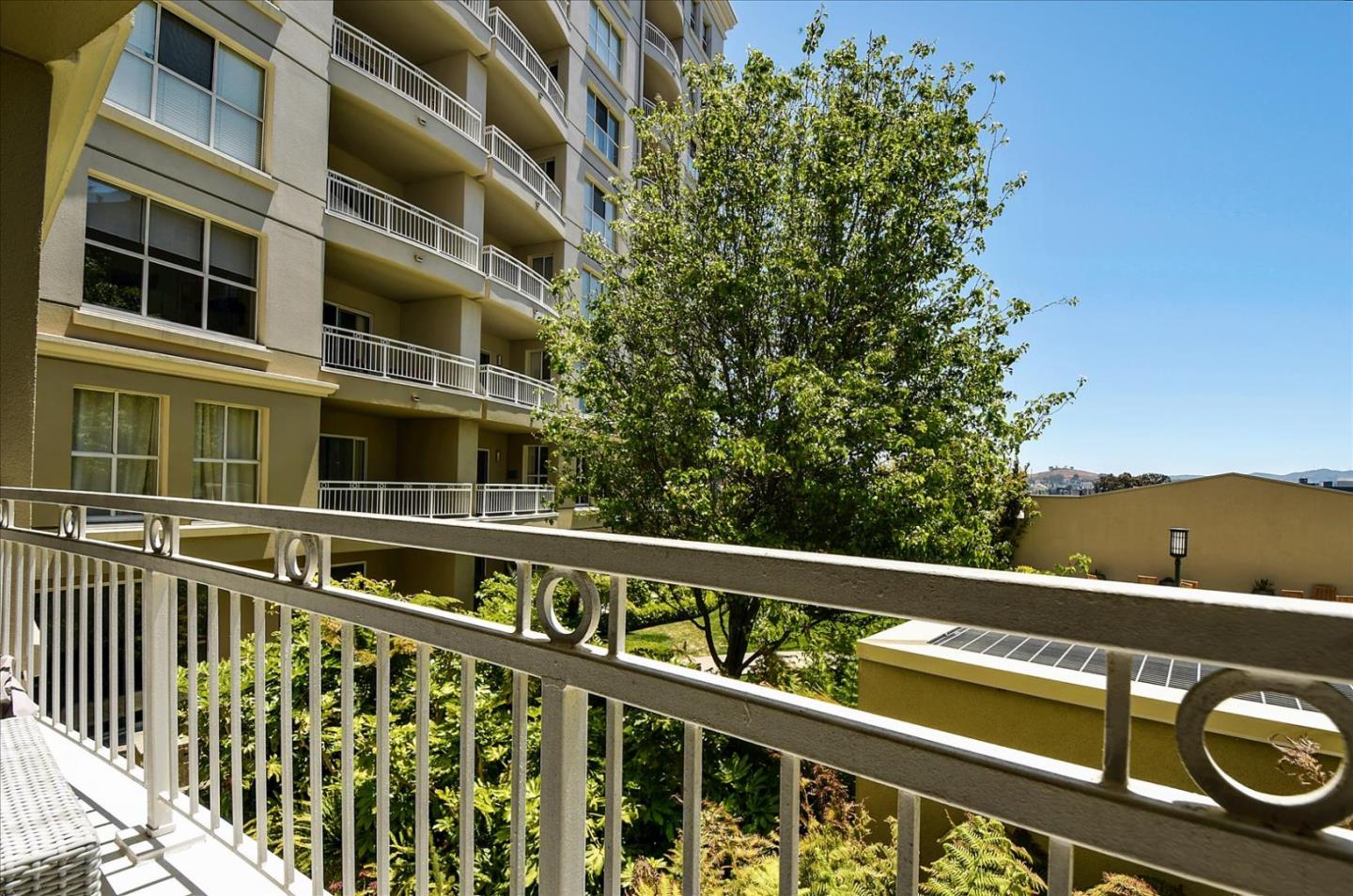 140 South Van Ness Avenue, Unit 422 San Francisco, CA 94103 - Photo 24 of 32 a view of a building from a balcony