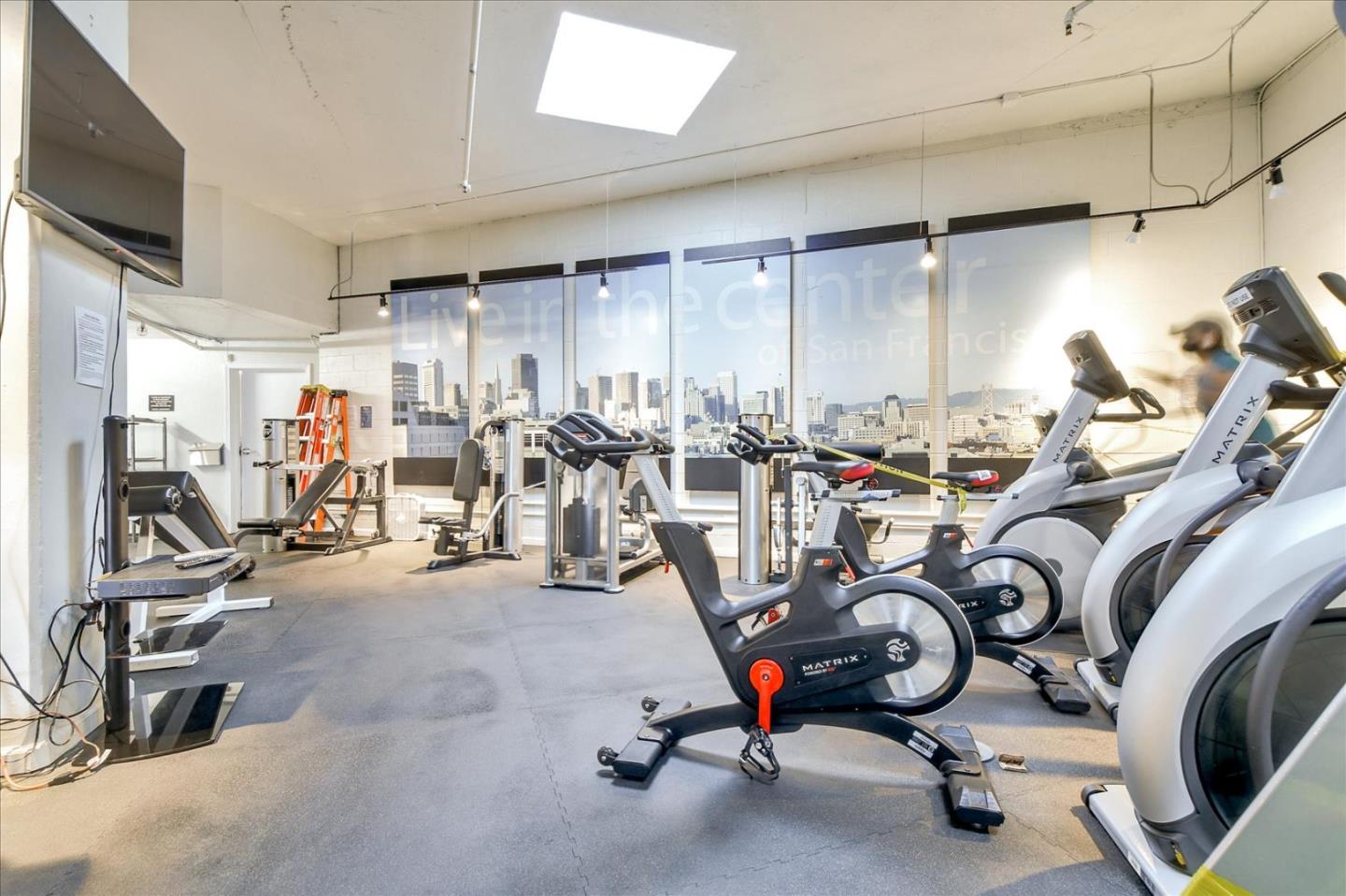 140 South Van Ness Avenue, Unit 422 San Francisco, CA 94103 - Photo 31 of 32 a view of a room with gym equipment