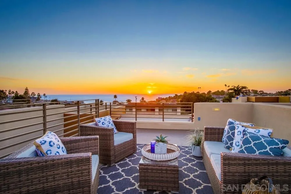 90 North Coast Highway 101, Unit 312 Encinitas, CA 92024 - Photo 1 of 19 a terrace with outdoor seating and city view