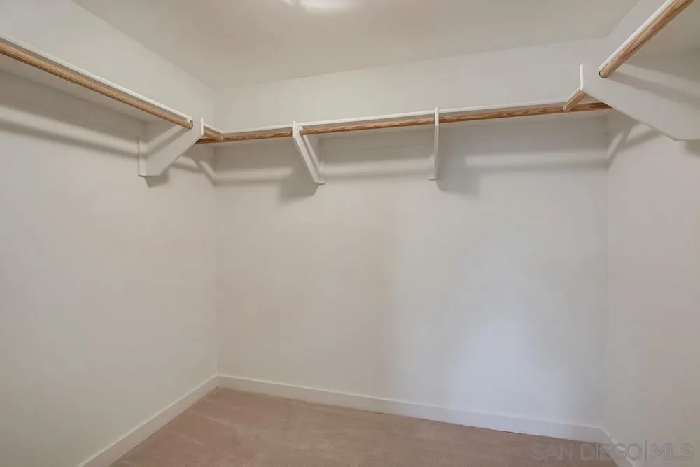 90 North Coast Highway 101, Unit 312 Encinitas, CA 92024 - Photo 9 of 19 a view of an empty walk in closet