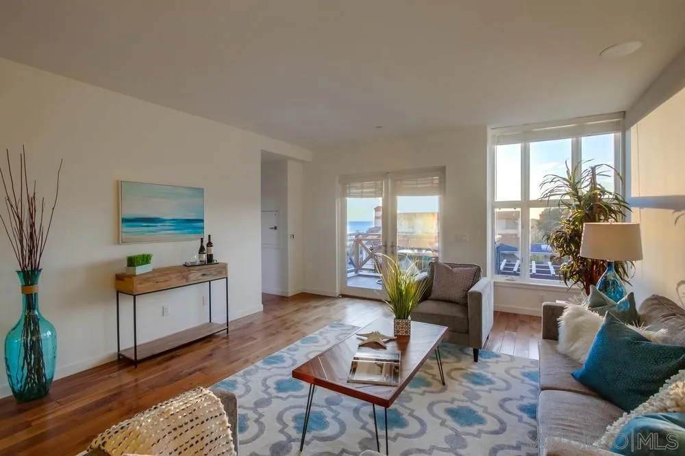 90 North Coast Highway 101, Unit 312 Encinitas, CA 92024 - Photo 10 of 19 a living room with furniture