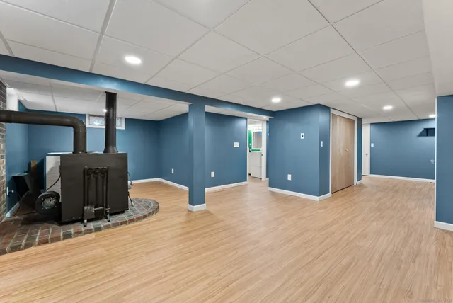 a view of a livingroom with a couch and furniture