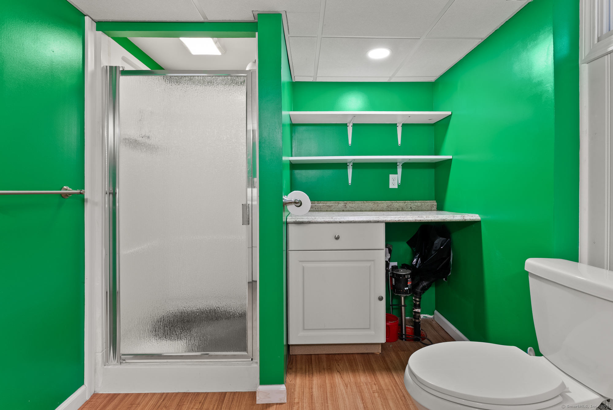 91 Till Street Enfield, CT 06082 - Photo 17 of 30 a bathroom with a toilet and a sink