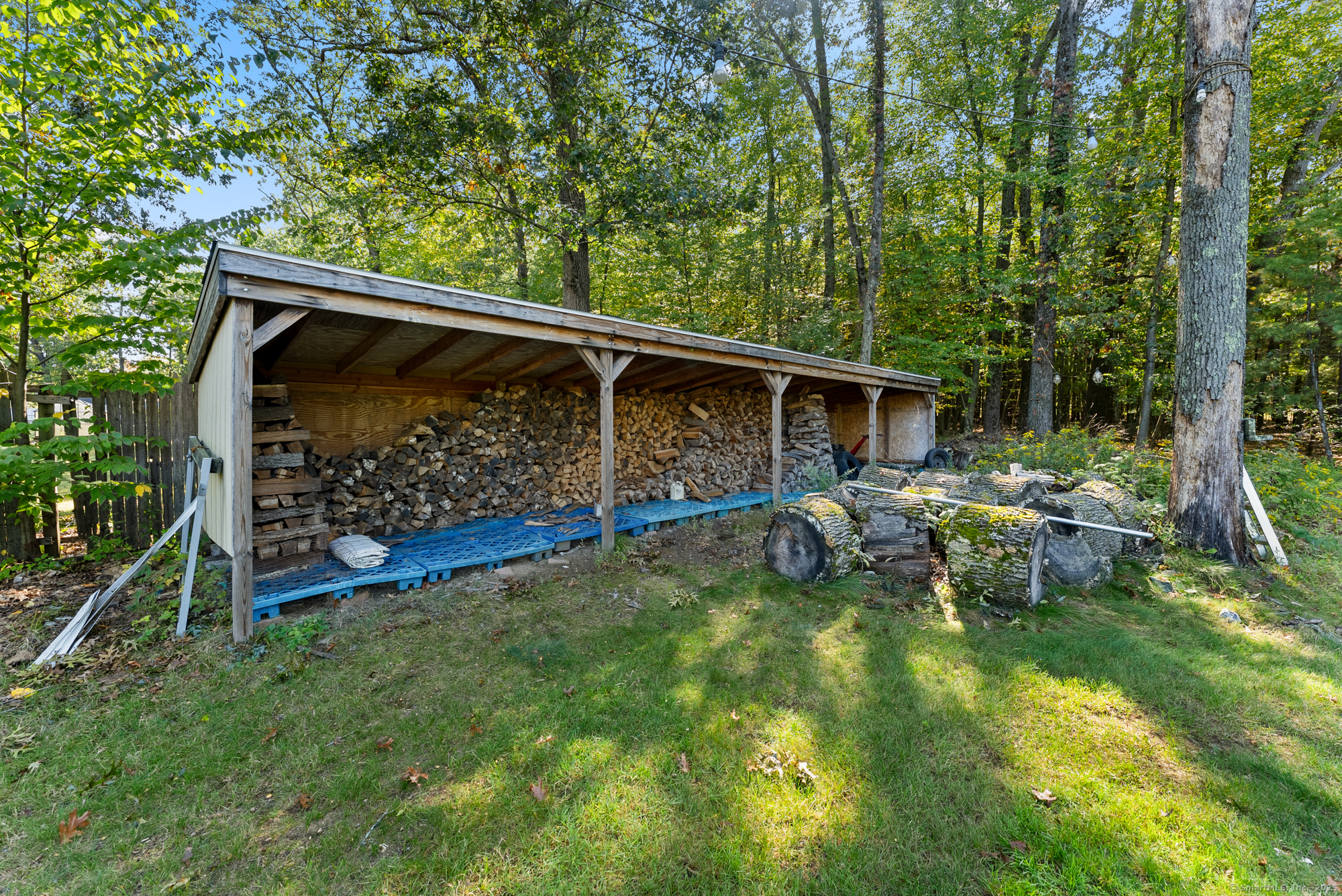 91 Till Street Enfield, CT 06082 - Photo 25 of 30 a view of backyard with green space