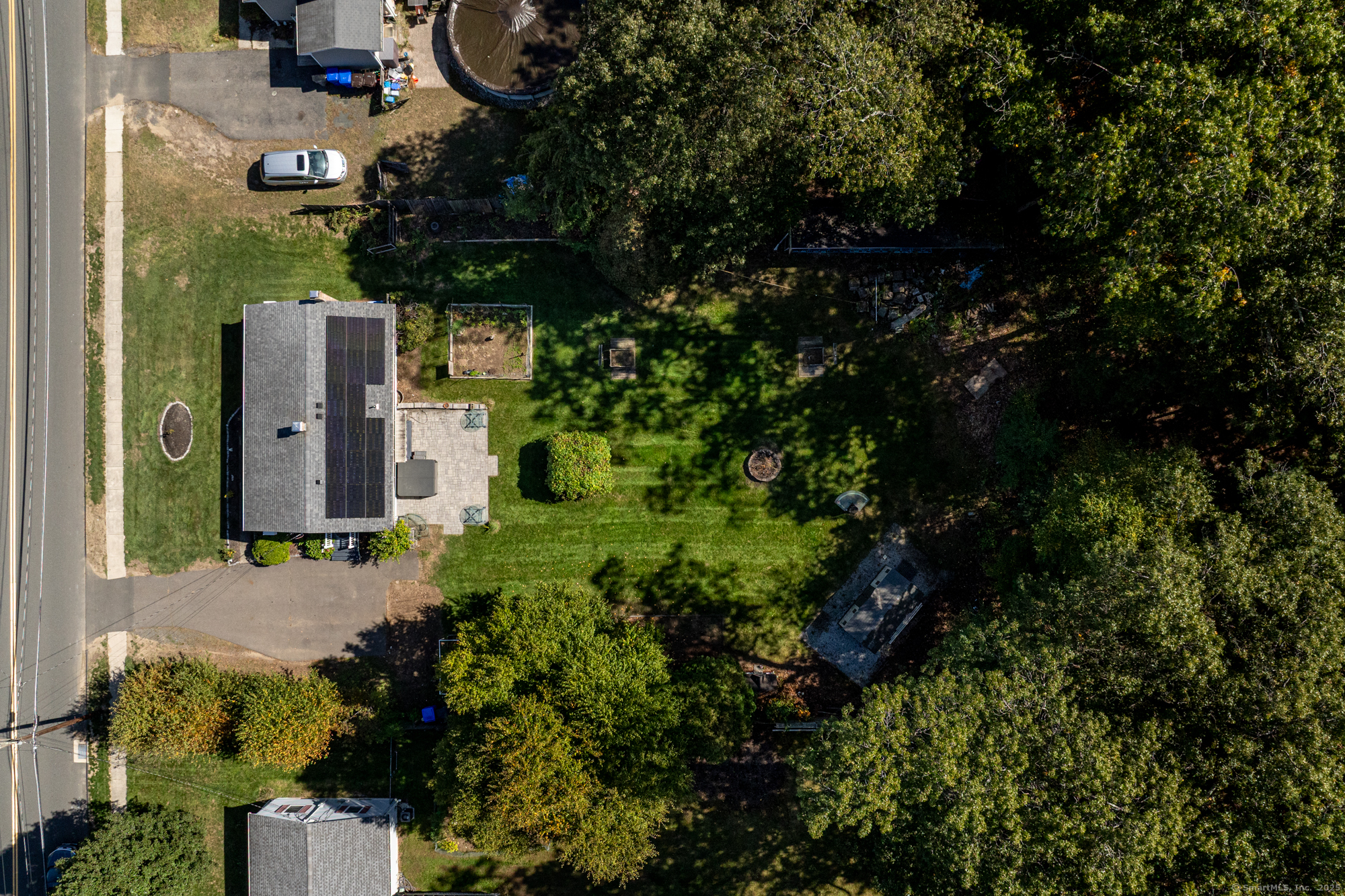 91 Till Street Enfield, CT 06082 - Photo 27 of 30 an aerial view of a house with a yard