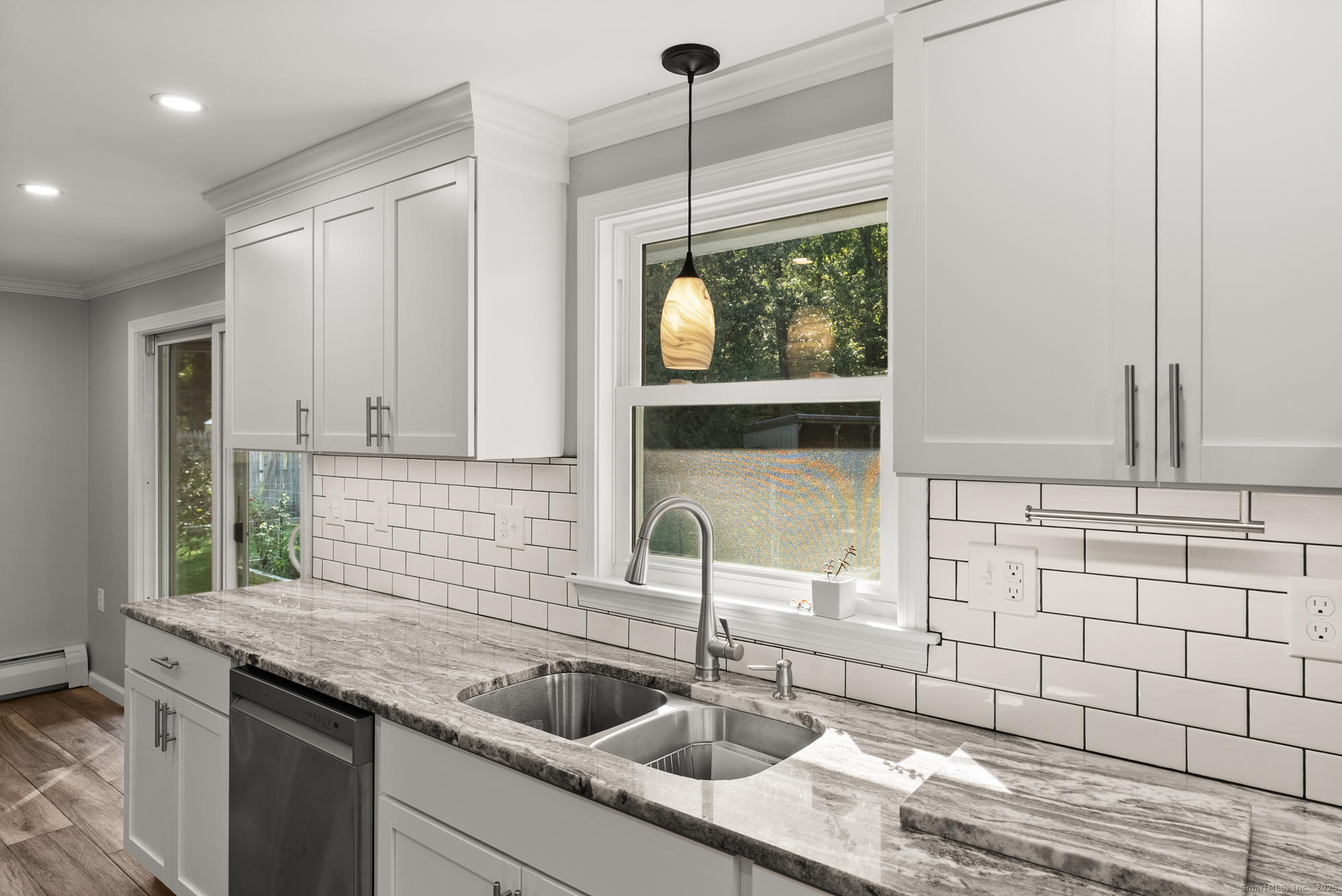 91 Till Street Enfield, CT 06082 - Photo 3 of 30 a kitchen with a sink and a window