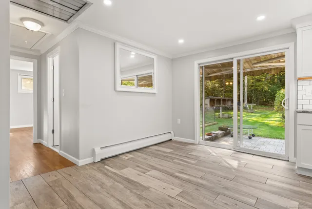 an empty room with floor to ceiling windows and floor to ceiling window