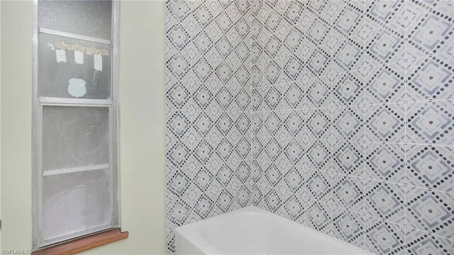 a living room with furniture and window