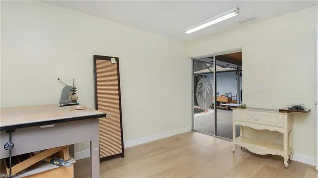 a swimming pool with outdoor seating and yard