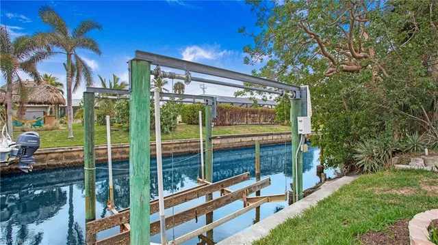 an aerial view of a house a yard and plants