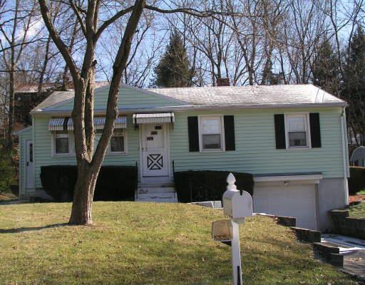 15 Edward Road Seymour, CT 06483 - Photo 1 of 1 a front view of a house with garden