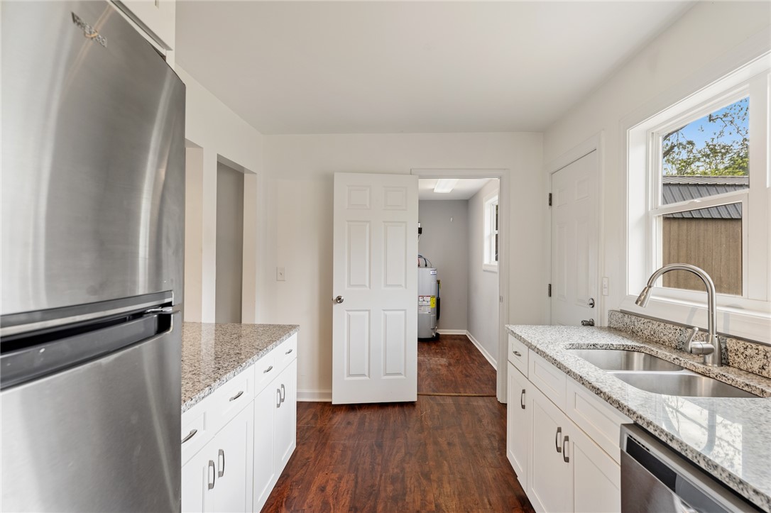 104 Leah Drive Pendleton, SC 29670 - Photo 11 of 23 This bright kitchen features gleaming countertops, a stainless steel refrigerator, and ample cabinetry for all your needs.