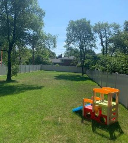 331 Selborne Road Riverside, IL 60546 - Photo 18 of 19 a view of a yard with a slide