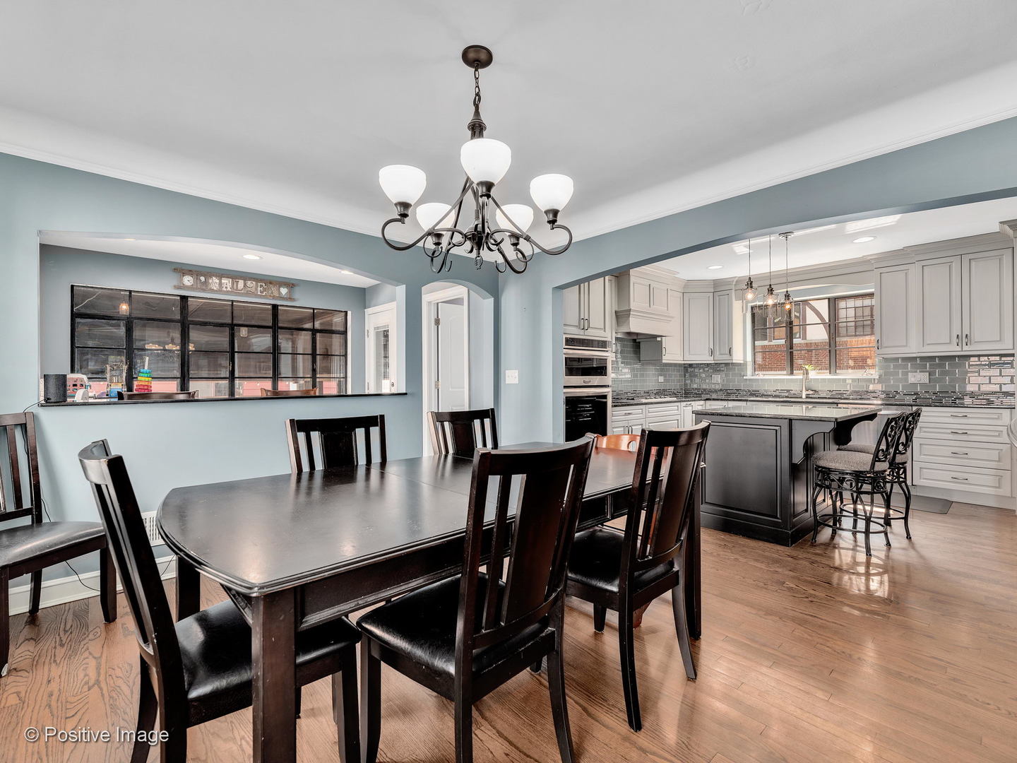 331 Selborne Road Riverside, IL 60546 - Photo 3 of 19 a view of a dining room with furniture and a chandelier