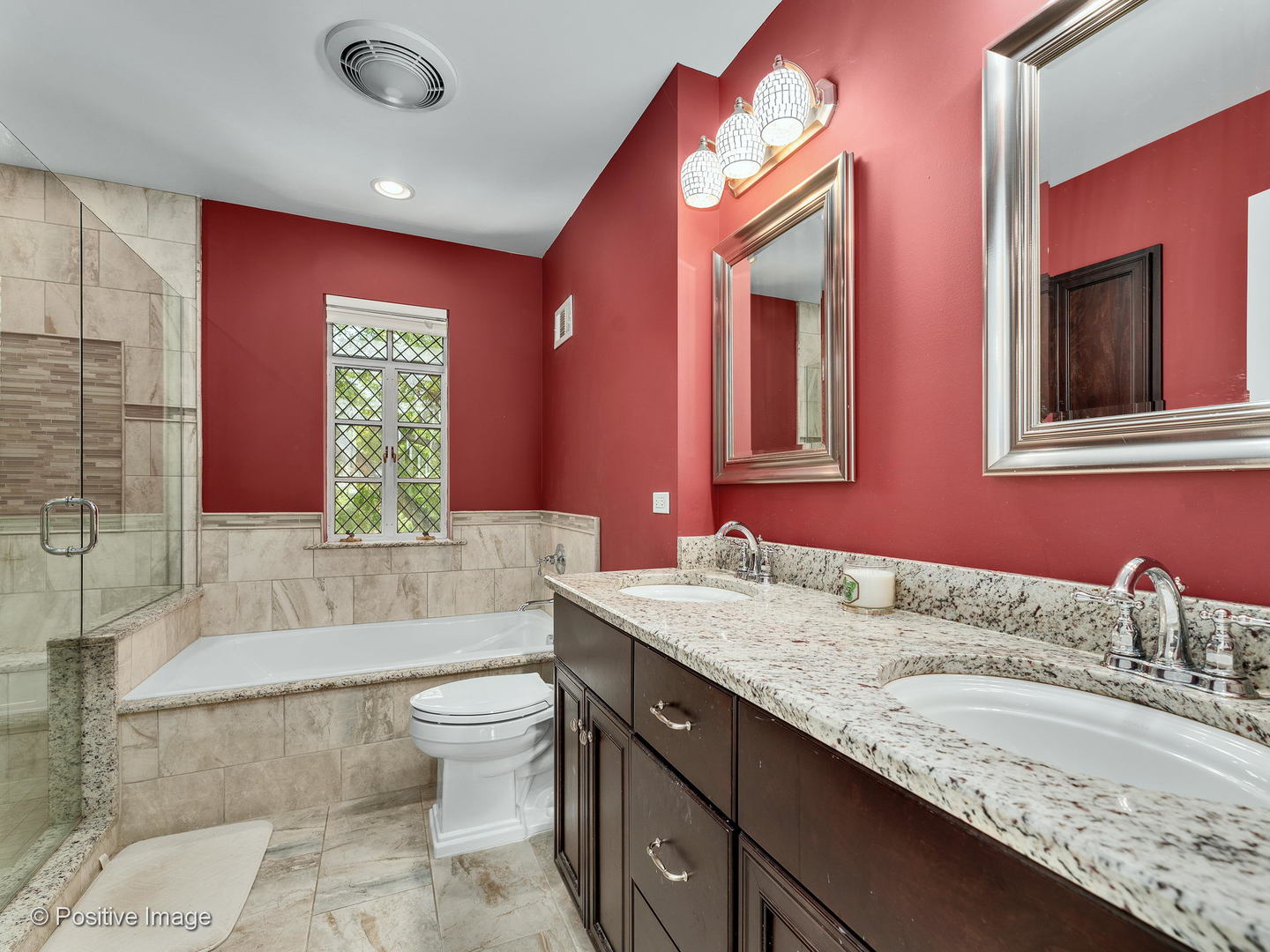 331 Selborne Road Riverside, IL 60546 - Photo 5 of 19 a bathroom with a granite countertop tub a double vanity sink a window and mirror