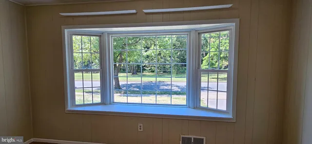 a view of a room that has a window