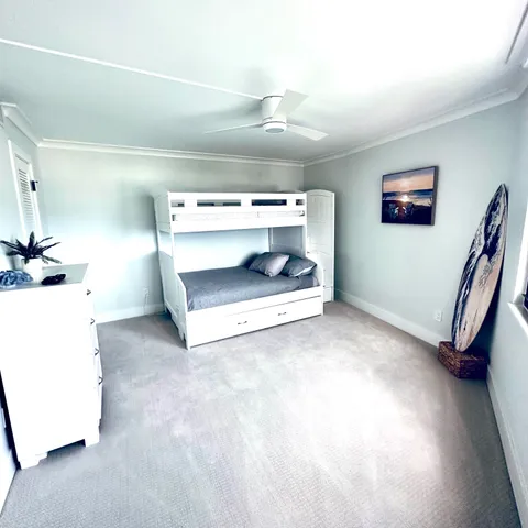 a view of an empty room with a fireplace