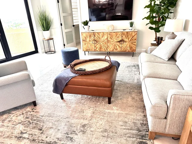 a living room with furniture and a couch